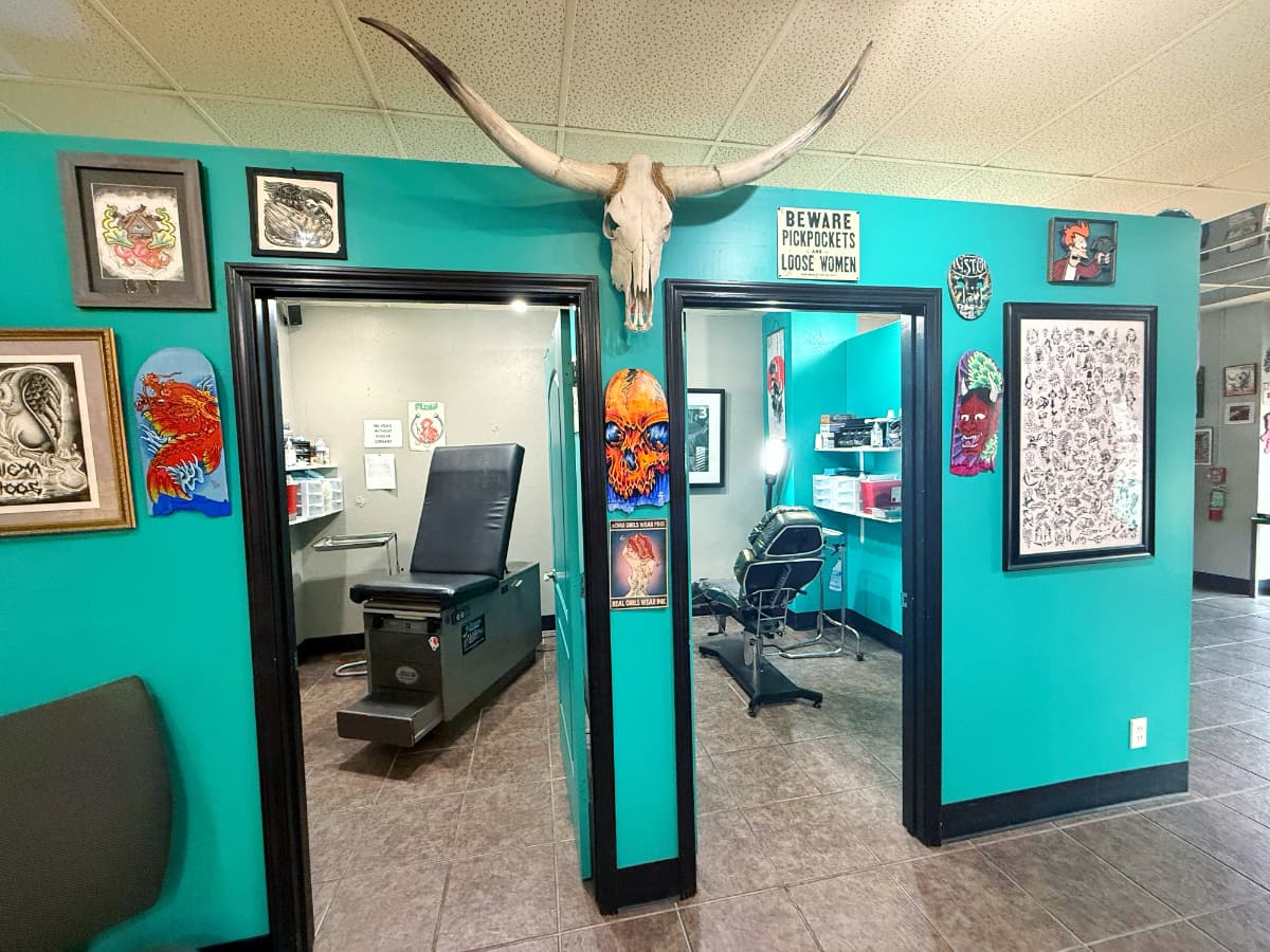 Tattoo studio with vibrant wall art and decor.